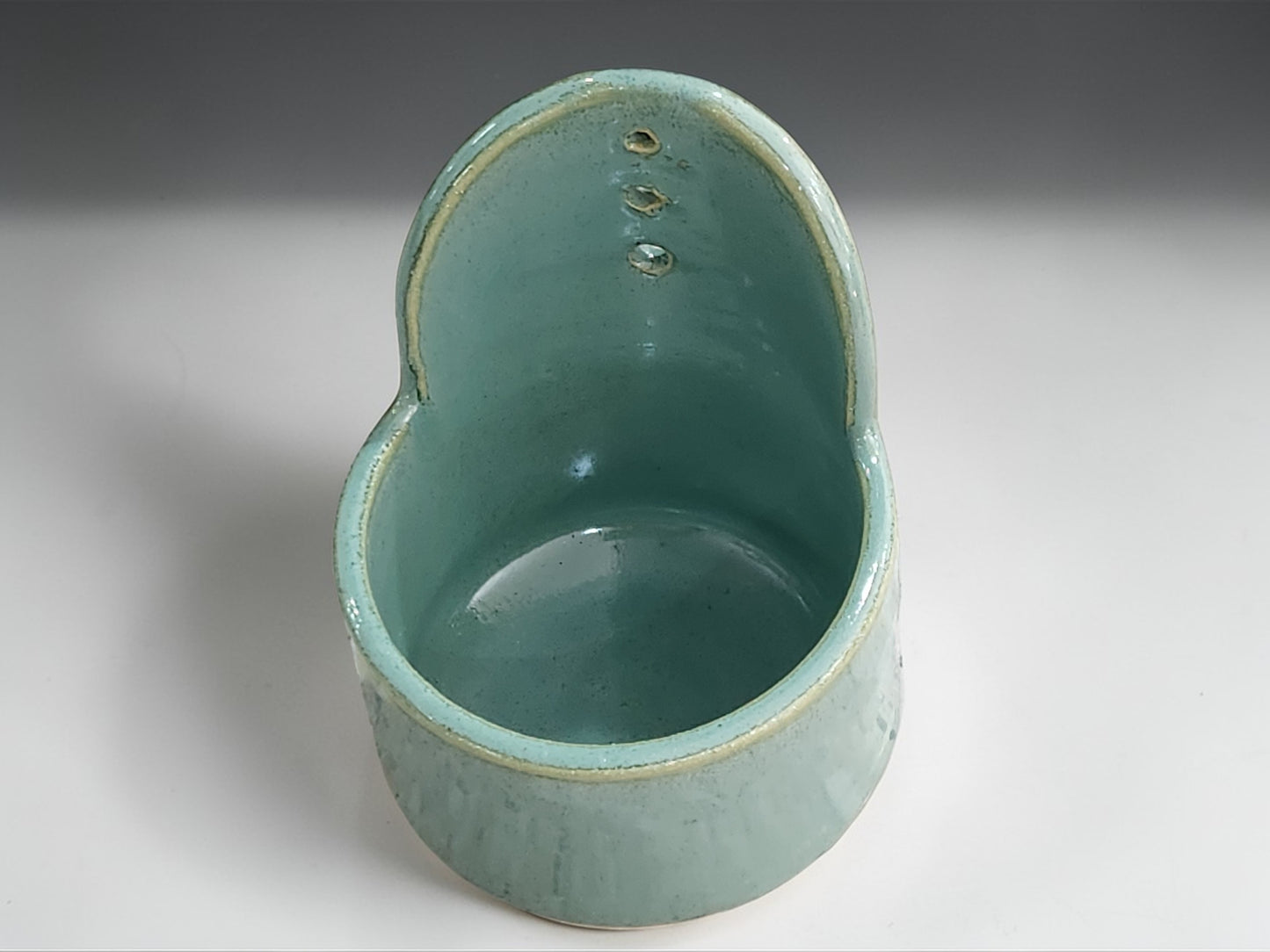 Wheel thrown ceramic herb stripper in spearmint green