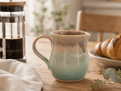 Blue Gum pottery jug lifestyle image with French press and croissant