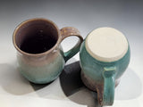 Handmade stoneware mugs with curved handle and subtle glaze variation, ceramic pottery mug
