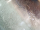 close up of the glaze on a Wheel-thrown ceramic salt pig with wide opening and organic brown to green glaze transition, handcrafted in Melbourne, Australia.