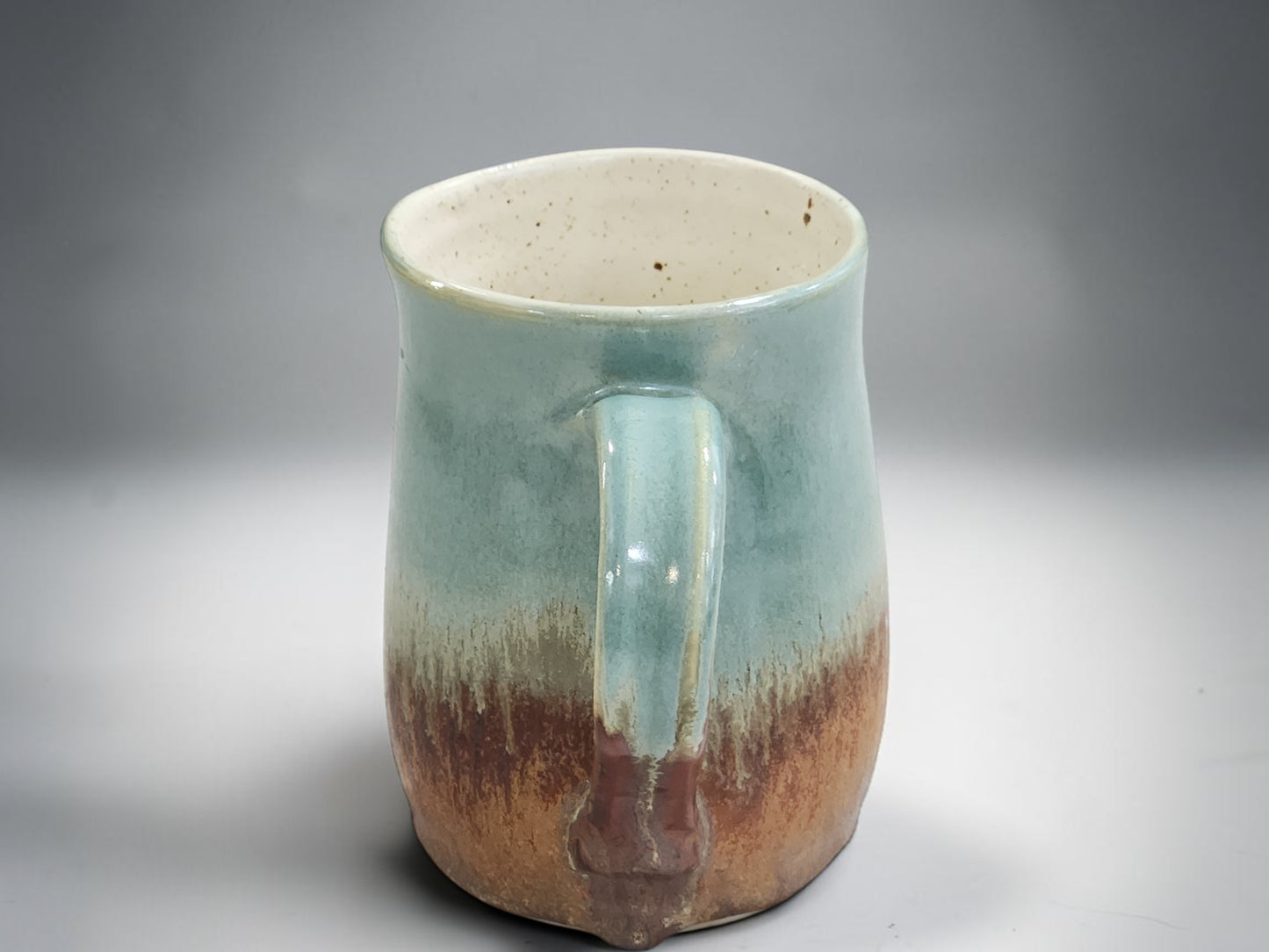Unique Australian handmade mug with organic glaze detail