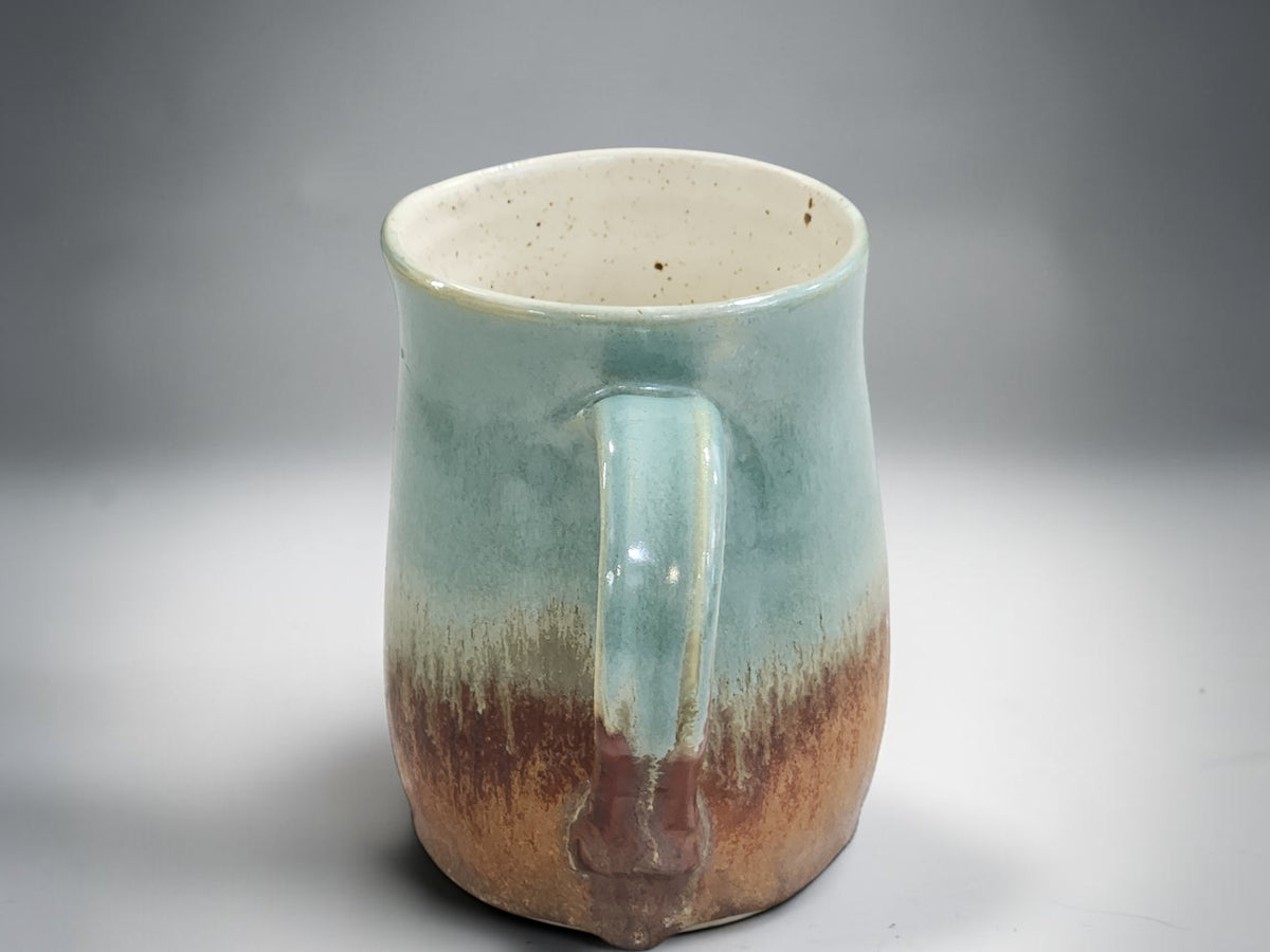 Unique Australian handmade mug with organic glaze detail