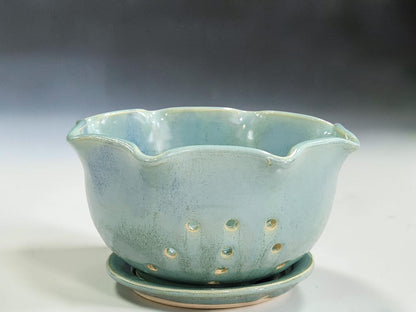 Spearmint green ceramic berry bowl with matching saucer