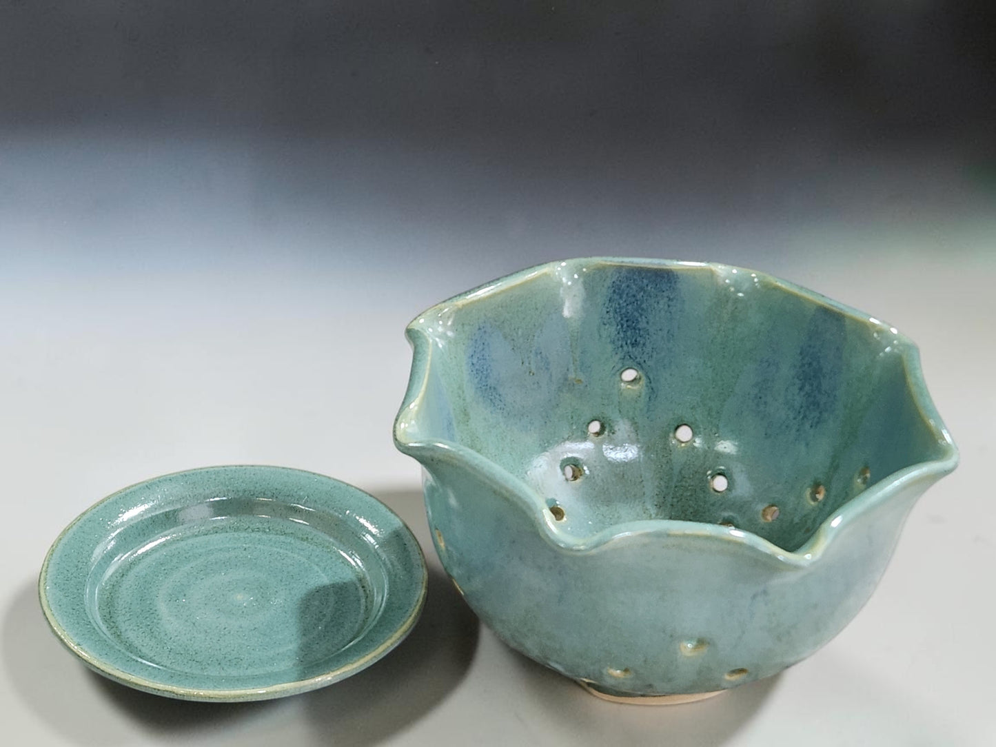 Australian handmade ceramic berry bowl with the saucer
