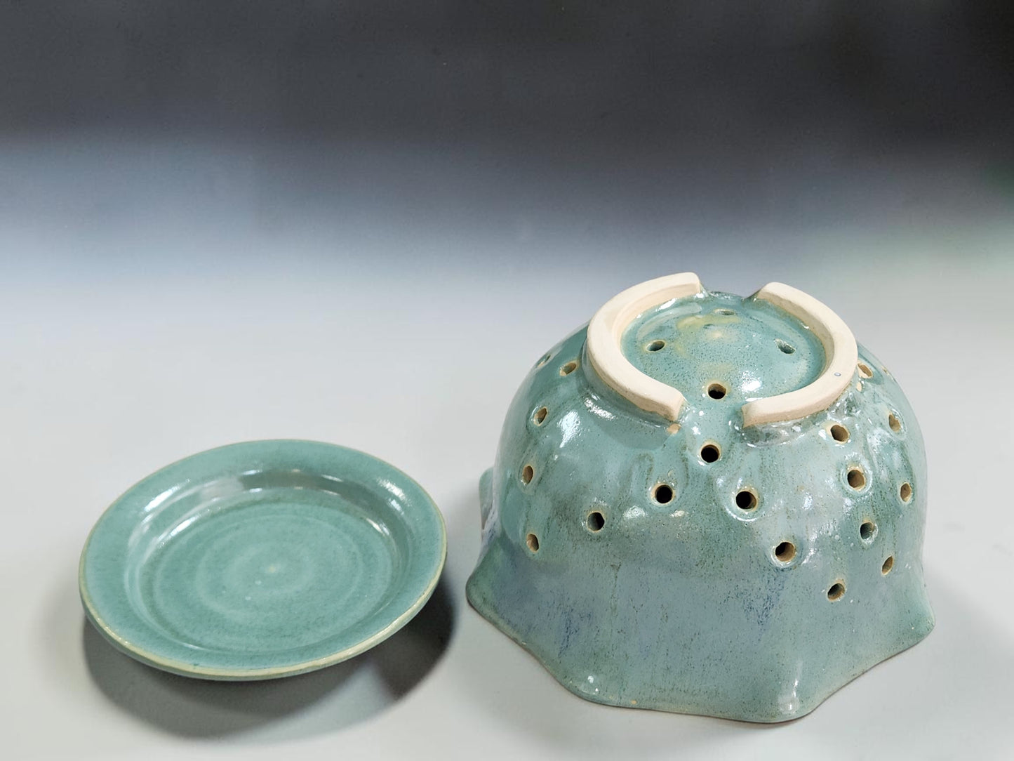 Spearmint green berry bowl in a bright kitchen lifestyle setting