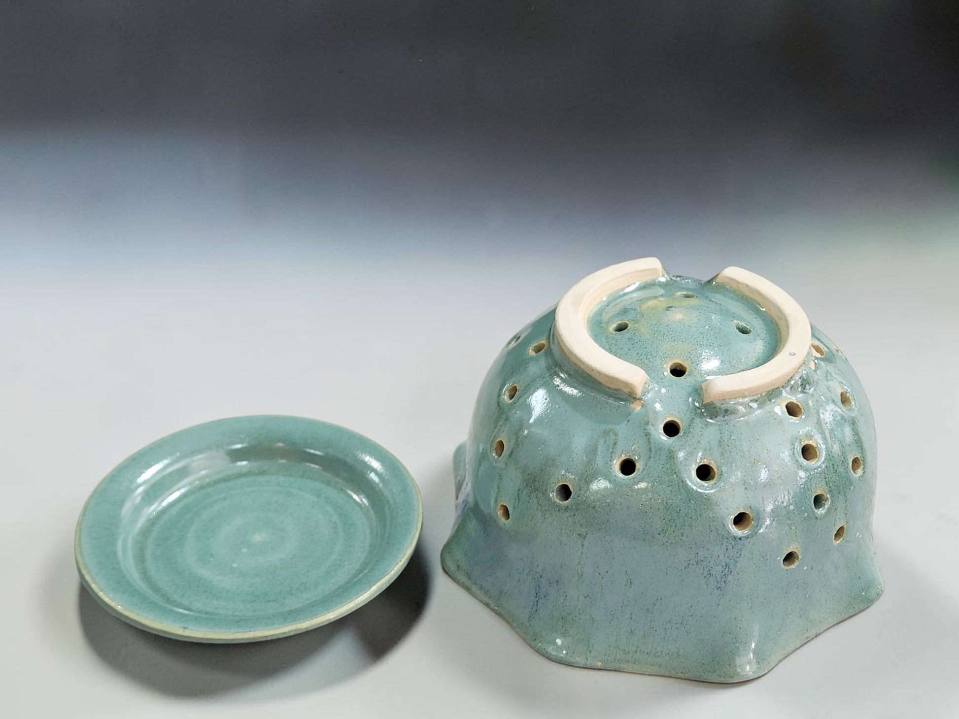Spearmint green berry bowl in a bright kitchen lifestyle setting