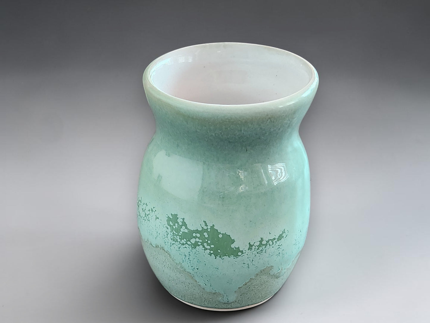 Unique handmade Australian ceramic vase in soft aqua tones
