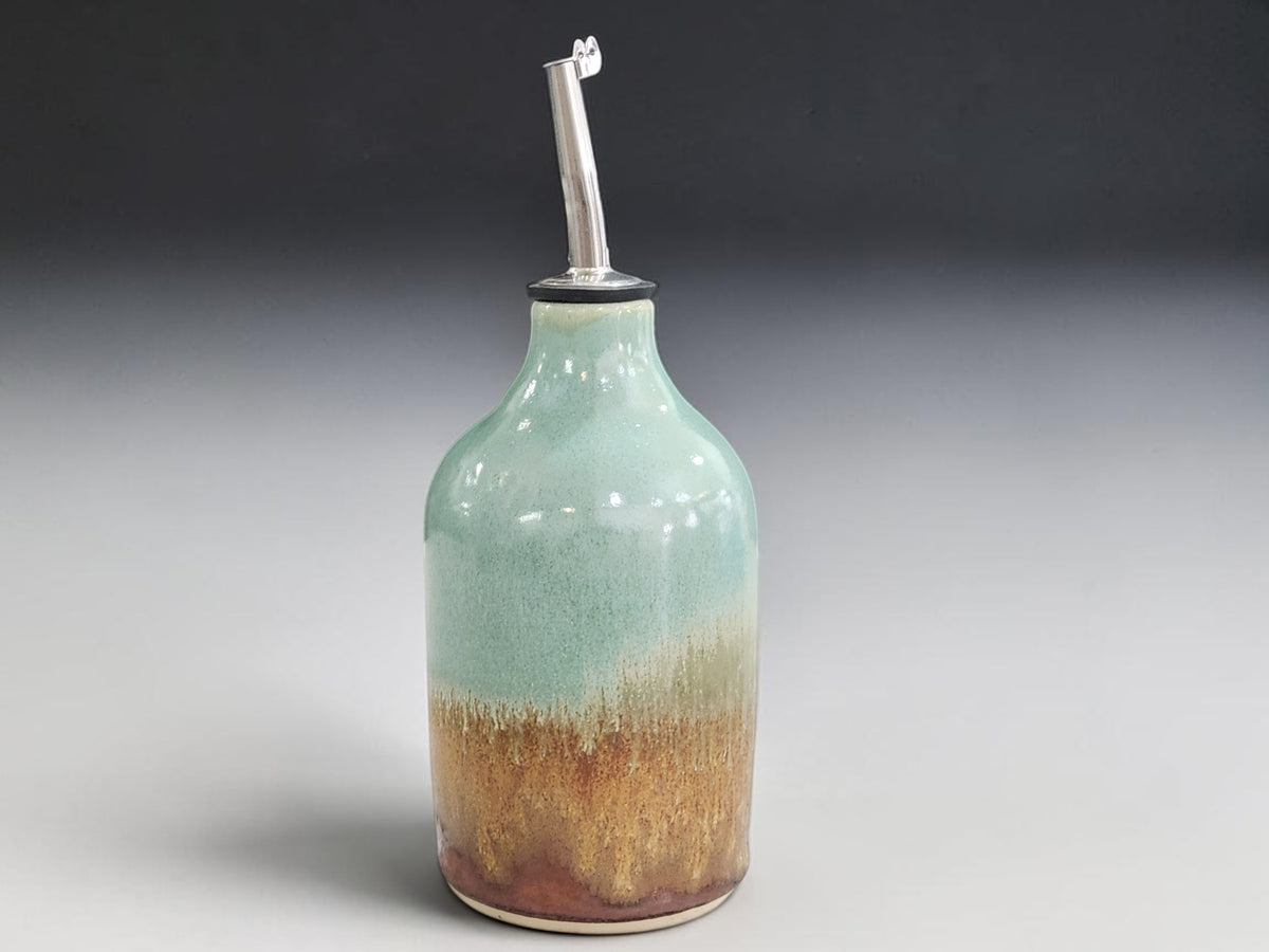 Handmade 450ml pottery oil bottle with spearmint and earthy brown glaze