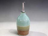 Handmade stoneware oil bottle with stainless steel pourer, crafted by Buxton Pottery in Melbourne Australia