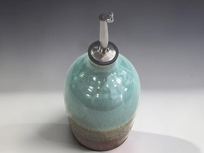 Australian handmade ceramic oil bottle with reusable stainless steel pourer and food-safe glaze