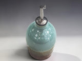Australian handmade ceramic oil bottle with reusable stainless steel pourer and food-safe glaze