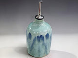 Australian handmade ceramic oil bottle with reusable stainless steel pourer for kitchen use