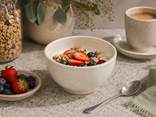 Handmade speckled cream ceramic cereal bowl with artisan pottery finish