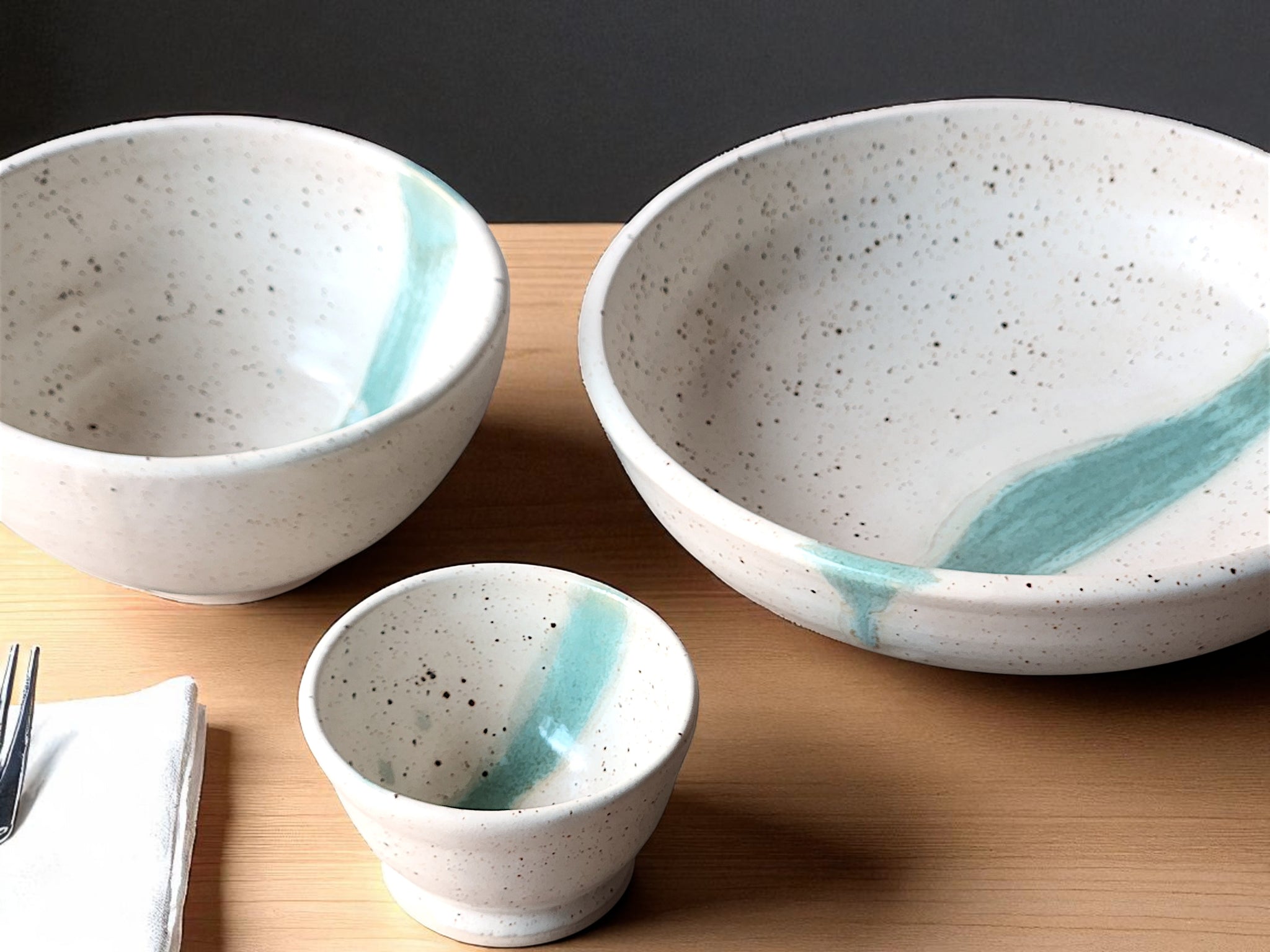 Handmade ceramic condiment bowl speckled cream with green slash
