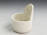 Artisan pottery herb stripper in speckled cream finish