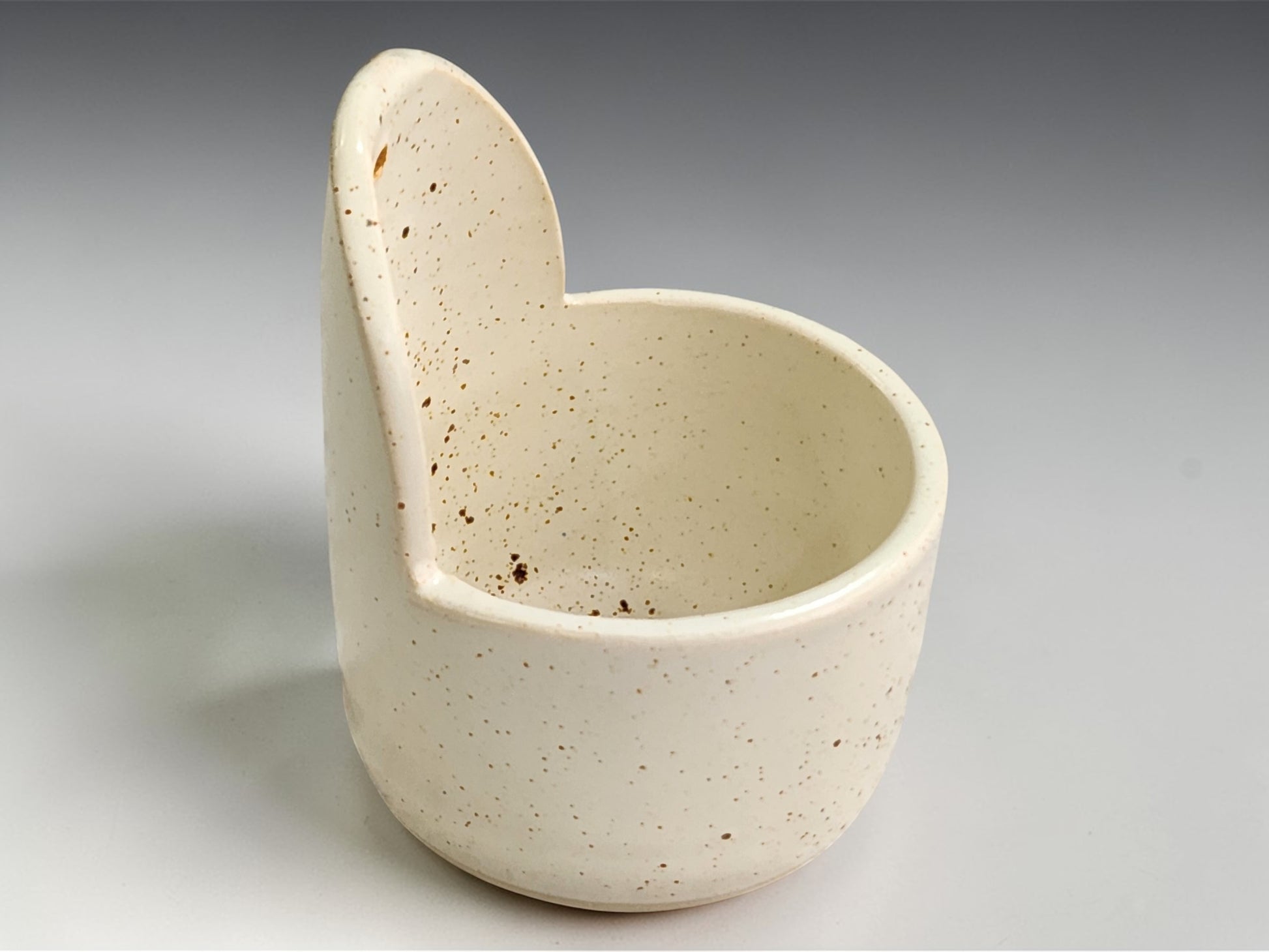 Australian handmade ceramic herb stripper in soft cream glaze