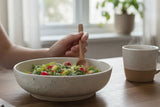 Handmade ceramic pasta bowl in speckled cream glaze