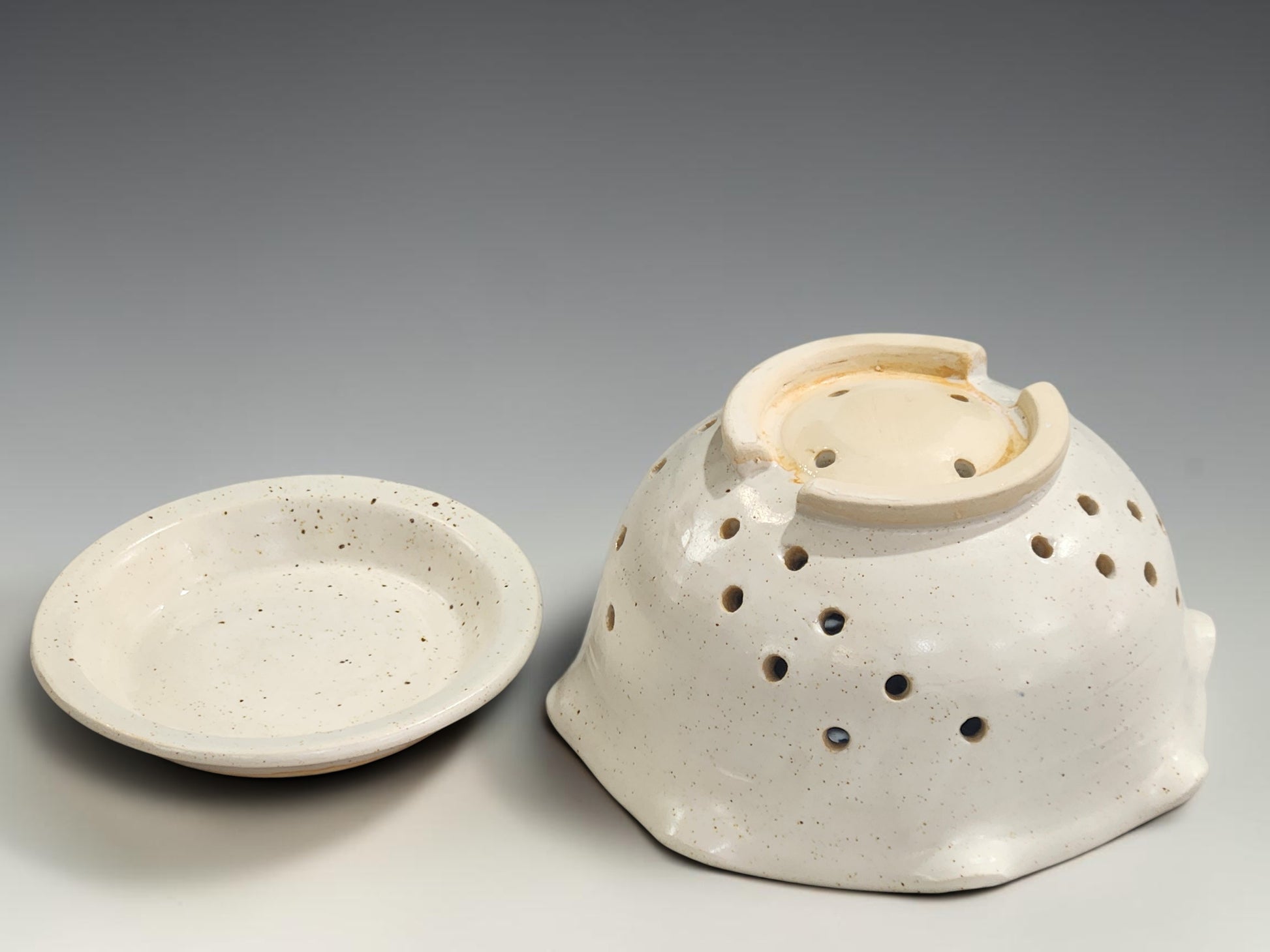 Ceramic berry bowl and saucer handmade in Melbourne with soft neutral speckled glaze