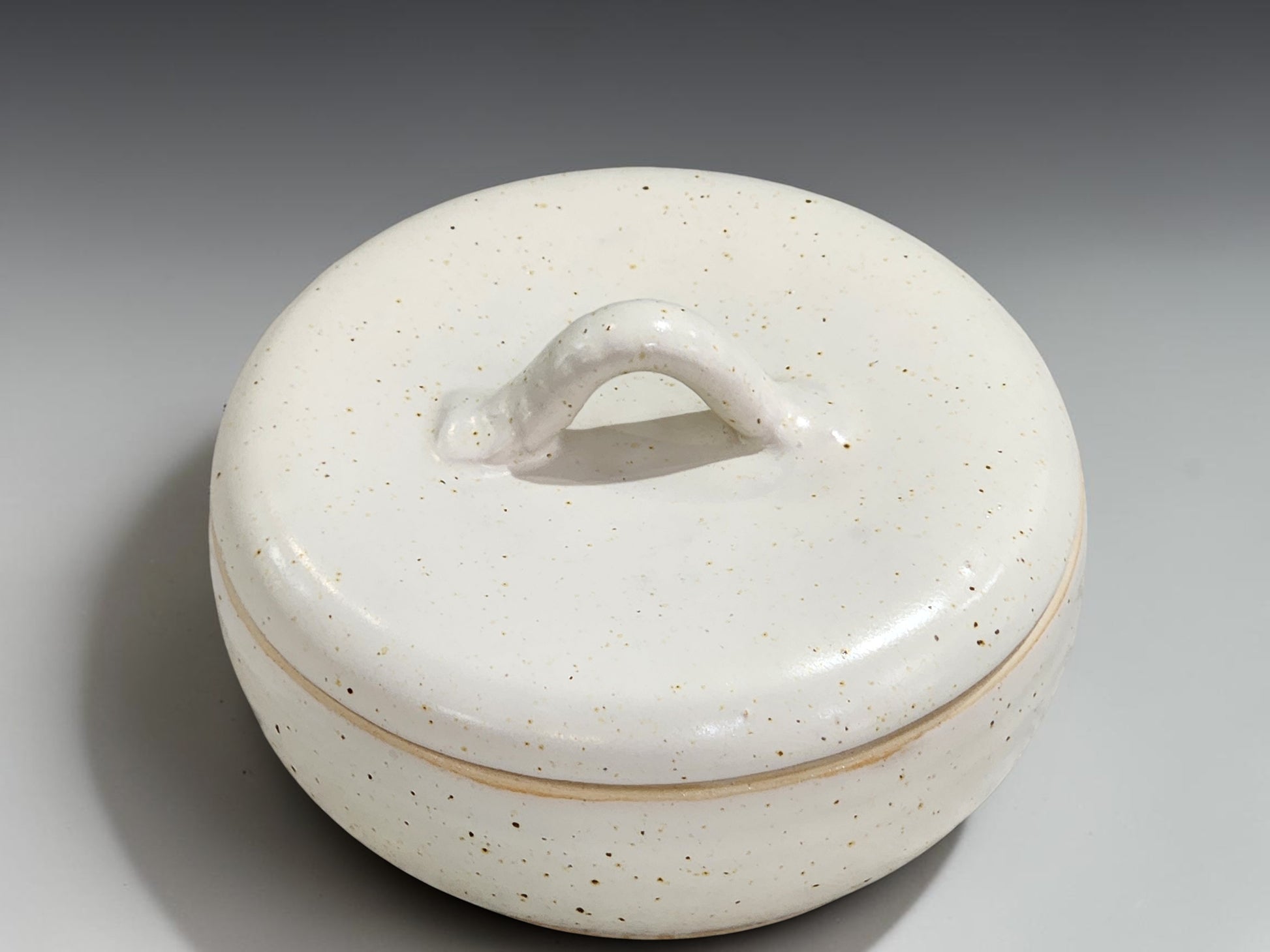 Handmade pottery storage bowl with lid
