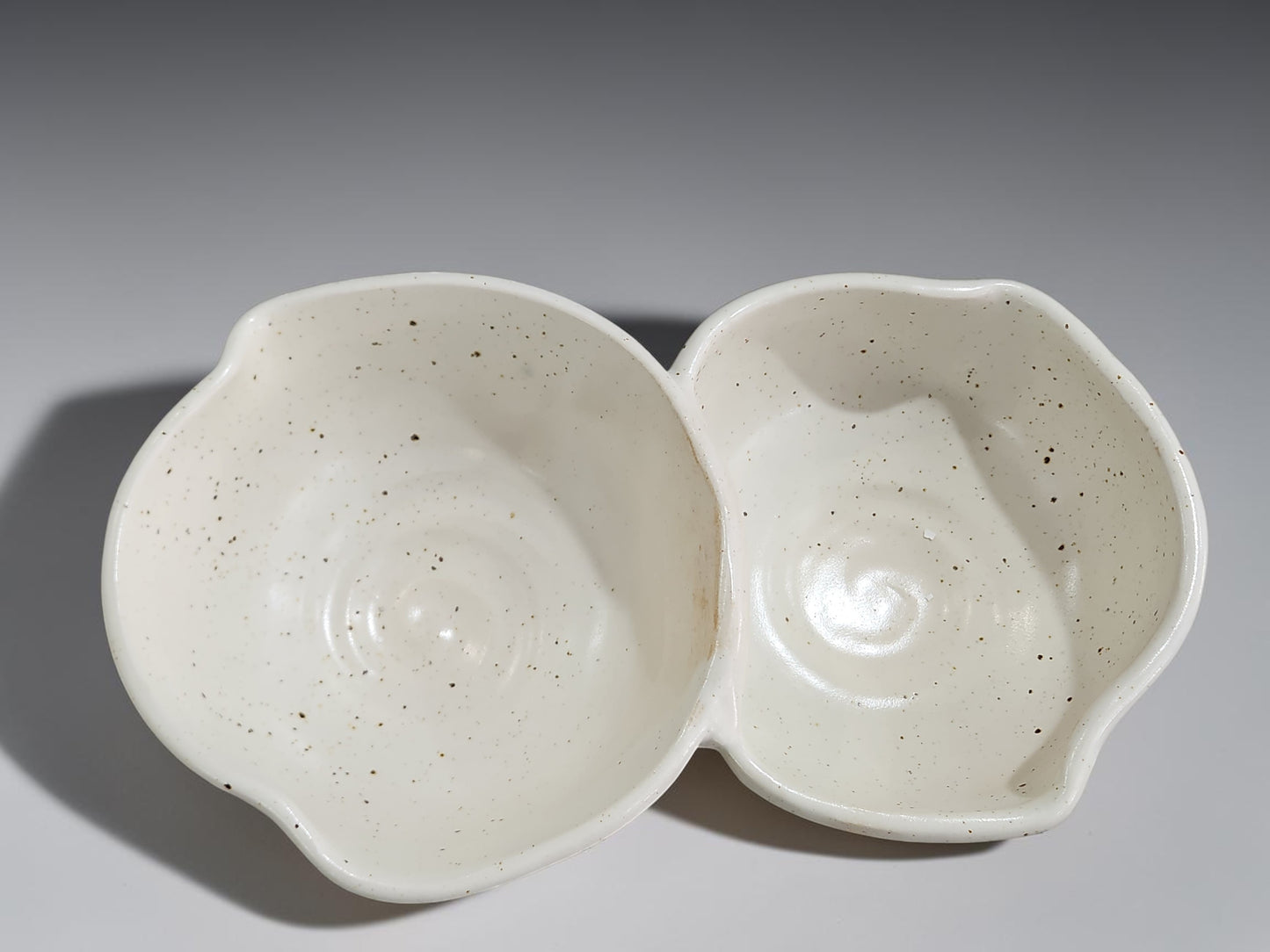 Handmade double snack bowl in speckled cream glaze