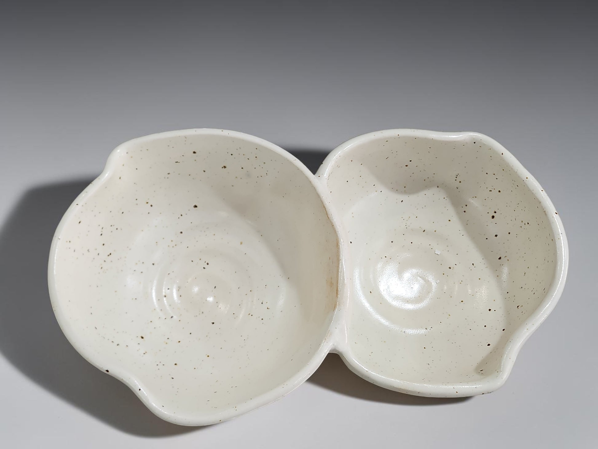 Handmade double snack bowl in speckled cream glaze