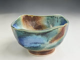 blue green ceramic bowl with earthy brown accents handmade pottery
