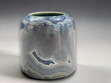 Experimental crystalline ceramic vase in blue and silver tones