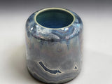 Handmade pottery vessel with galaxy-inspired crystal glaze