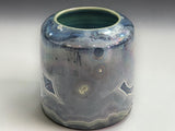 Experimental ceramic art pot with blue crystalline glaze