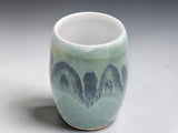 Front view of handmade Australian ceramic vase with glossy landscape-inspired glaze.
