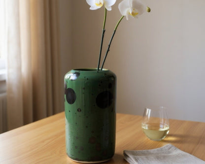 Handmade tall green crystalline pottery vase with metallic glaze
