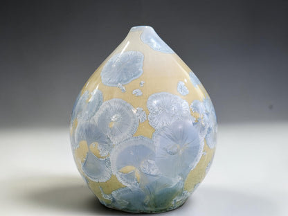 ower-body detail showing deeper blue-grey glaze near the base of the cream pot.