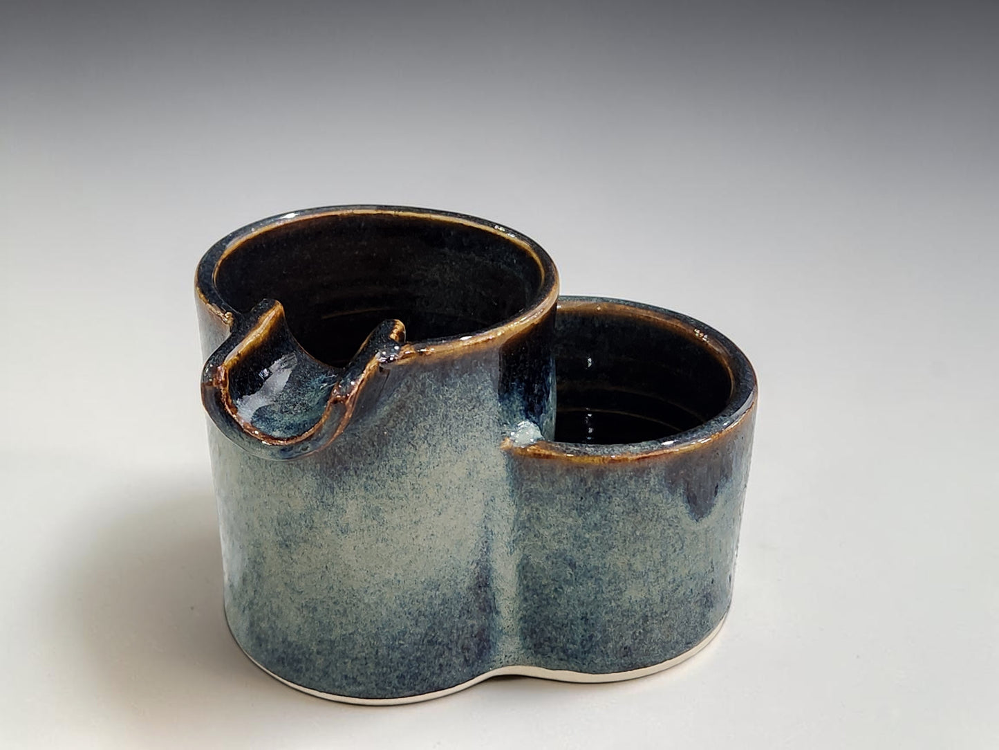 Ceramic ashtray with built-in lighter pot in blue and brown Tenmoku glaze