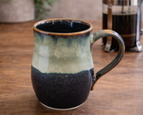 Handmade Tenmoku and cream pottery mug 400ml by Buxton Pottery