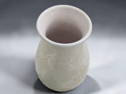Wheel-thrown porcelain flower vase measuring 15 cm tall