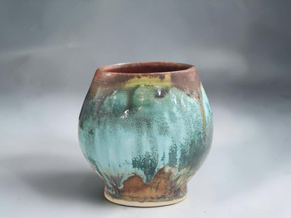 Australian handmade pottery teacup with rounded Japanese-inspired handleless design