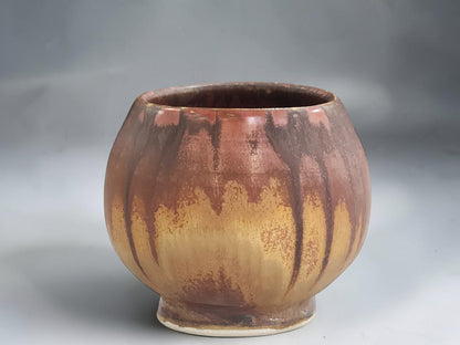 Handmade ceramic Japanese teacup with earthy brown and ochre glaze from the Bush Creek Earth Collection