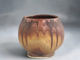 Handmade ceramic Japanese teacup with earthy brown and ochre glaze from the Bush Creek Earth Collection