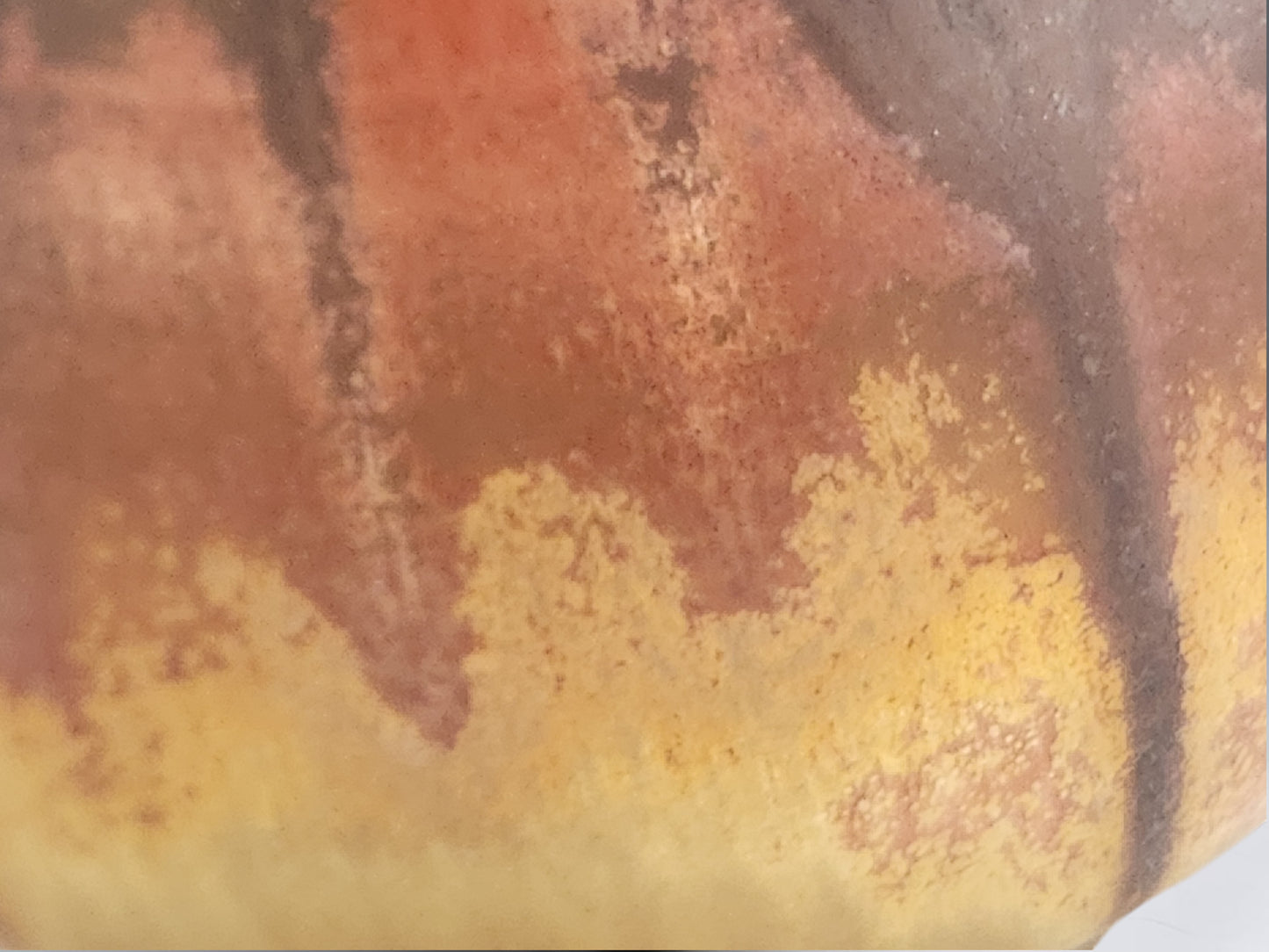 Close-up of Bush Creek Earth glaze showing rich earthy brown and ochre colour transitions on handmade pottery